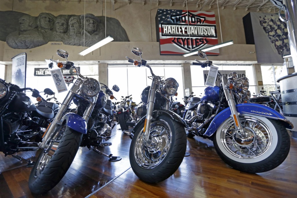 This Tuesday, April 25, 2017, photo shows Harley-Davidson motorcycles on display in the showroom at a dealership in Miami. On Wednesday, Sept. 27, 2017, the Commerce Department releases its August report on durable goods. (AP Photo/Alan Diaz)