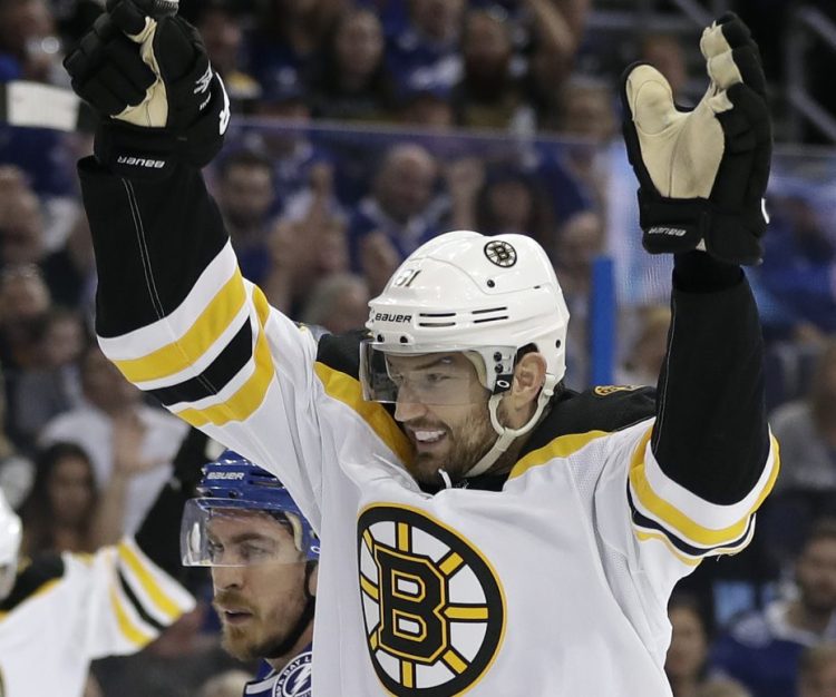 Rick Nash of the Bruins celebrates the first of his two goals Saturday in Game 1 of the second-round playoff series against the Tampa Bay Lightning. Boston won, 6-2.