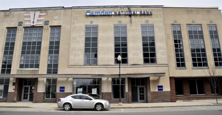 Colby College plans to buy the Camden National Bank building in downtown Waterville and demolish it to make room for a hotel development next door on the former Levine's store site.