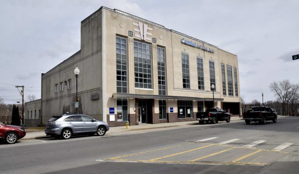 Colby College plans to buy the Camden National Bank building in downtown Waterville and demolish it to make room for a hotel development next door on the former Levine's store site.