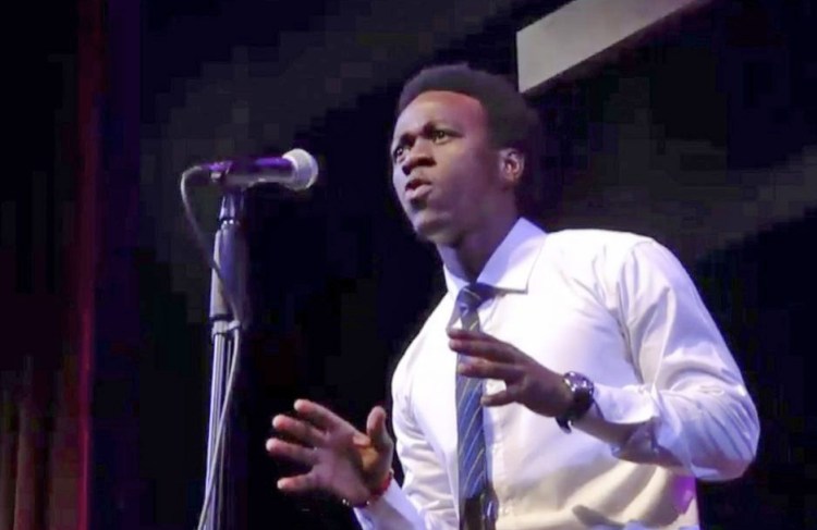 Allan Monga, a Deering High School junior, performs during a recent Poetry Out Loud competition. 