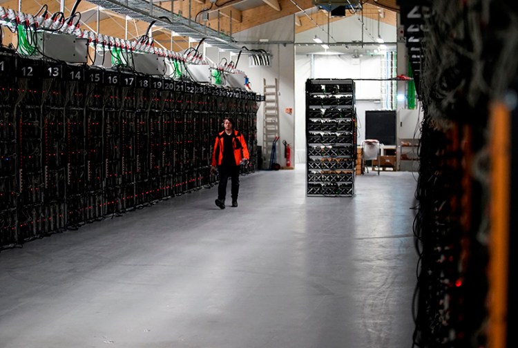 Computer rigs that run around the clock 'mining' bitcoin inside the Genesis Mining cryptocurrency mine in Keflavik, Iceland. 