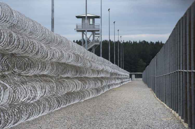 Razor wire protects a perimeter of the Lee Correctional Institution in Bishopville, S.C.