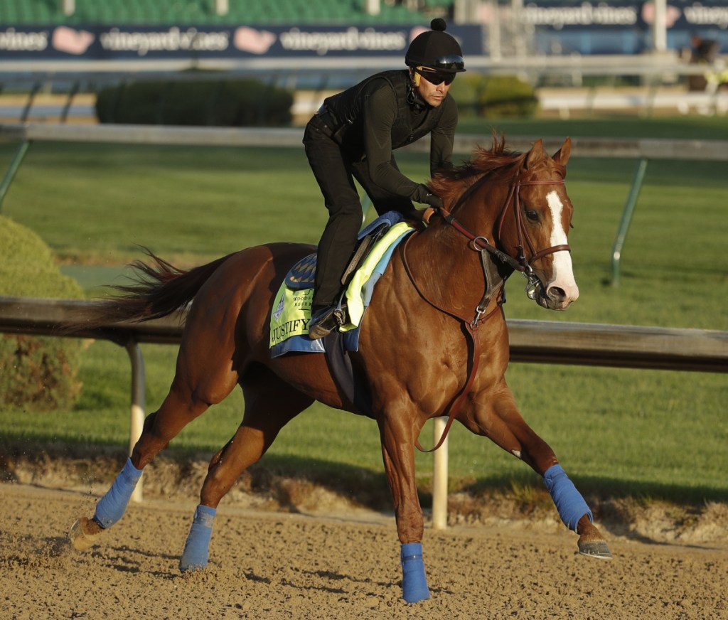 Kentucky Derby hopeful Justify runs during a morning workout at Churchill Downs on Tuesday in Louisville, Kentucky. The 144th running of the Kentucky Derby is scheduled for Saturday and Justify, the favorite at 3-1, drew the No. 7 post.
