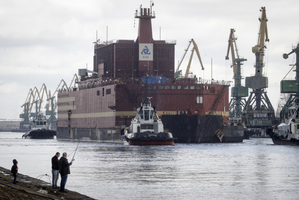 The floating reactor Akademik Lomonosov leaves St. Petersburg, Russia. The reactor has drawn fierce criticism about the danger of exposing nuclear power to raging seas.