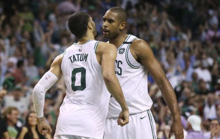 Jayson Tatum and Al Horford continued to play championship-level basketball Thursday night for the Boston Celtics, but the Philadelphia 76ers won't go away easily at home Saturday. Not at all.
