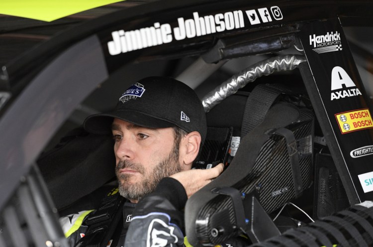 Jimmie Johnson gets ready before practice on Saturday at Dover International Speedway in Dover, Del.