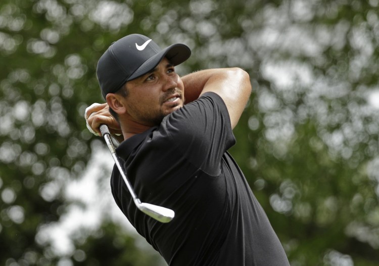 Jason Day, of Australia, watches his tee shot on the sixth hole Saturday at the Wells Fargo Championship golf tournament at Quail Hollow Club in Charlotte, N.C.