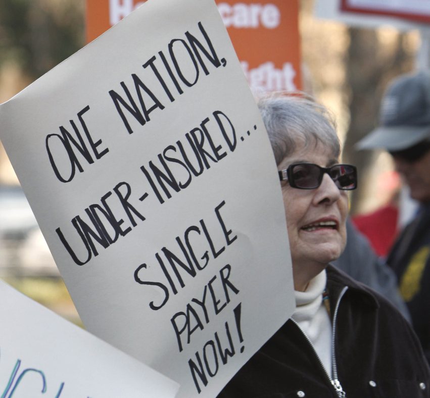 Advocates of a single-payer health care system rally in Sacramento, Calif., in 2012. The U.S. should follow Canada's lead, a writer says.