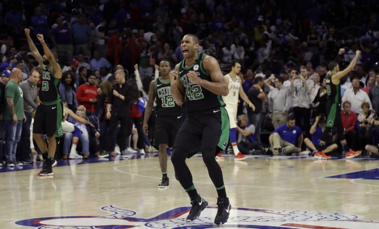 Boston's Al Horford celebrates after the Celtics won Game 3 of their second-round series with Philadelphia, 101-98 in overtime on Saturday in Philadelphia.