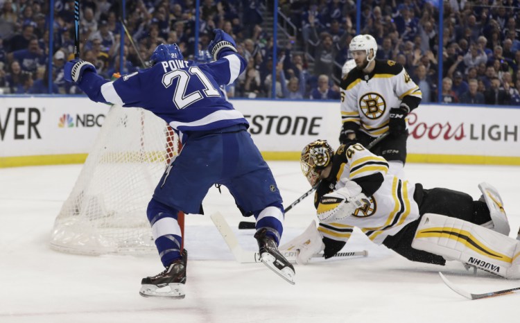 Tampa Bay center Brayden Point celebrates after scoring past Boston goaltender Tuukka Rask during the second period of Game 5 of of their Eastern Conference semifinal series Sunday in Tampa, Fla. Tampa Bay won 3-1 to finish off the series, beating Boston 4-1.