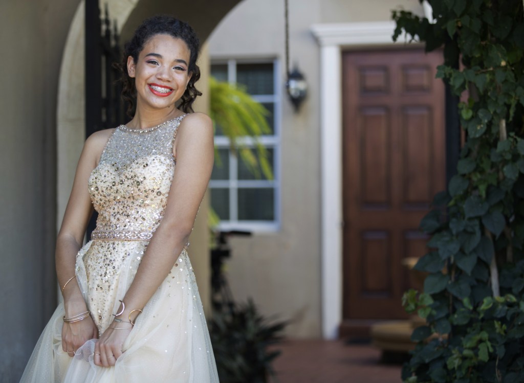 Stoneman Douglas senior Nicole Barreto is ready for her prom Saturday. Nicole, a member of the band, was good friends with Carmen Schentrup, one of the 17 victims of the shooting. (Jennifer Lett/South Florida Sun-Sentinel via AP)
