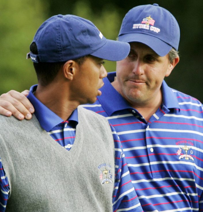 The Ryder Cup in 2004 was one of the few times Phil Mickelson, right, and Tiger Woods played together. They are in the same group with Rickie Fowler to start The Players Championship.