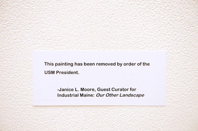 This message has replaced each of the three paintings by Bruce Habowski at a campus art show in Lewiston. The show's curator says USM's decision is an act of censorship, but her criticism is misplaced.