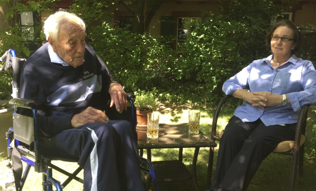Australian scientist David Goodall, 104, sits beside Carol O'Neil, an Australian nurse and volunteer with the nonprofit, right-to-die group Exit International, in Basel, Switzerland, Tuesday. Goodall has scheduled his assisted-suicide for Thursday.