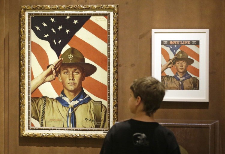 Andrew Garrison of Salt Lake City, looks over the Rockwell exhibition at the Mormon Church History Museum in Salt Lake City, Utah in 2013.