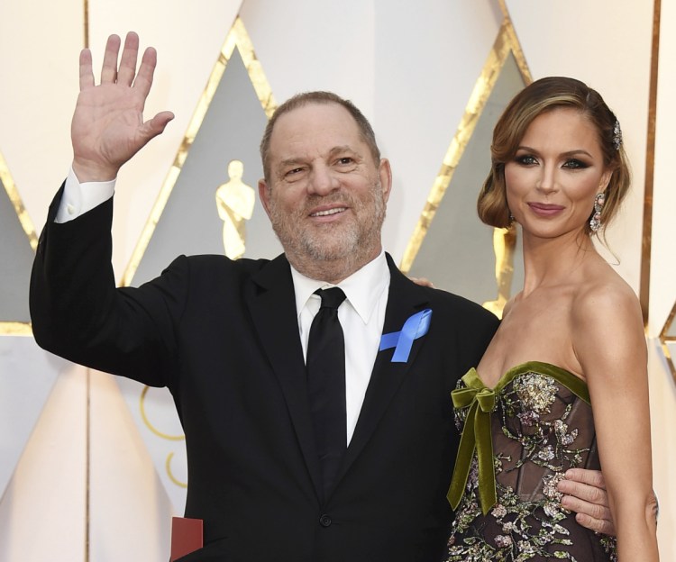 Producer Harvey Weinstein and fashion designer Georgina Chapman arrive at the Oscars in Los Angeles in 2017. Chapman, Weinstein's estranged wife, has given a tearful interview in Vogue magazine.