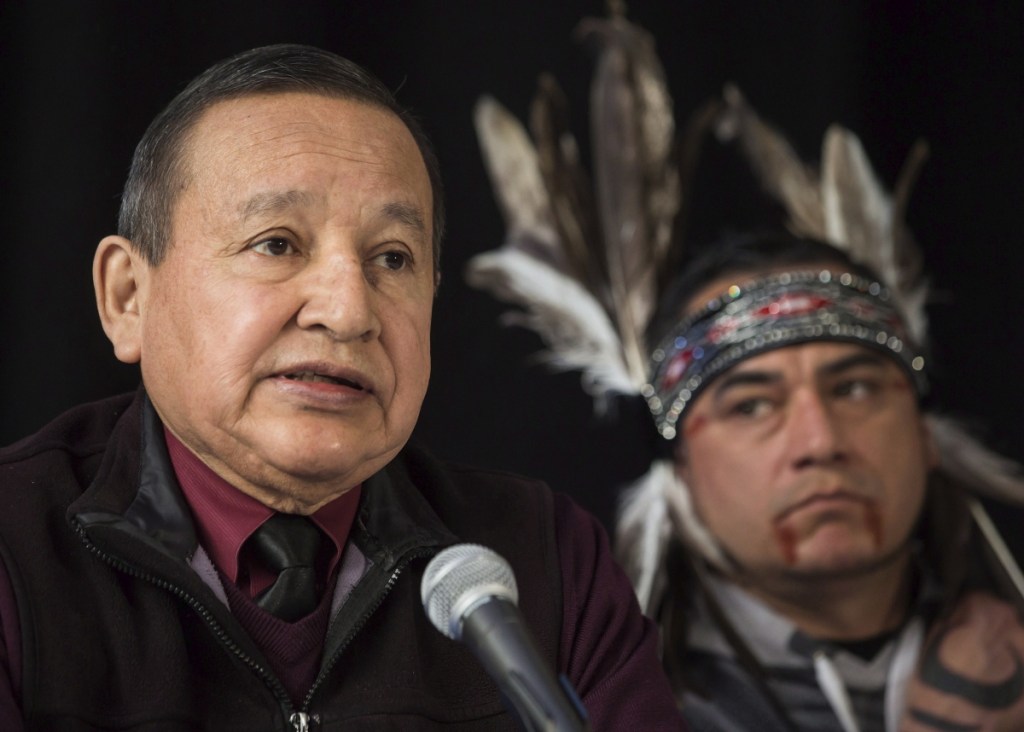 Stewart Phillip, left, Grand Chief of the Union of British Columbia Indian Chiefs, expresses his opposition last month to the pipeline project, citing the "catastrophic" risks in would pose to Vancouver and its environs.