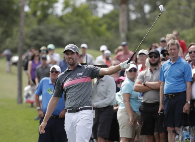 Webb Simpson shot a 4-under par 68 in the third round to stretch his lead at The Players Championship to seven shots Saturday in Ponte Vedra Beach, Fla.
