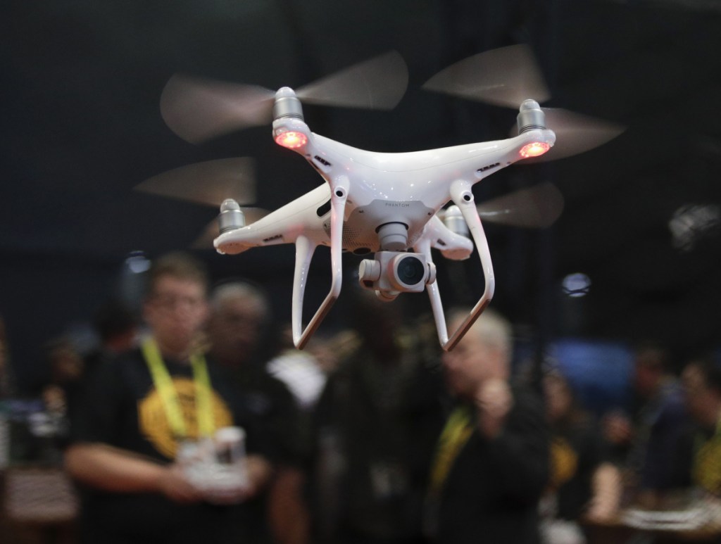 Existing legal restrictions on taking defensive action have frustrated federal authorities and pro sports officials as more drones are being flown over public and private facilities.
Associated Press/
Jae C. Hong