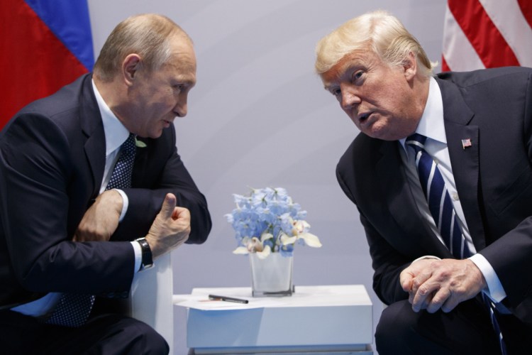 President Trump meets with Russian President Vladimir Putin at the G20 Summit on July 7, 2017, in Hamburg, Germany. The Senate Intelligence Committee has concluded that Russia meddled in the 2016 election with the intention of helping Trump, a finding that runs counter to what House Republicans say.