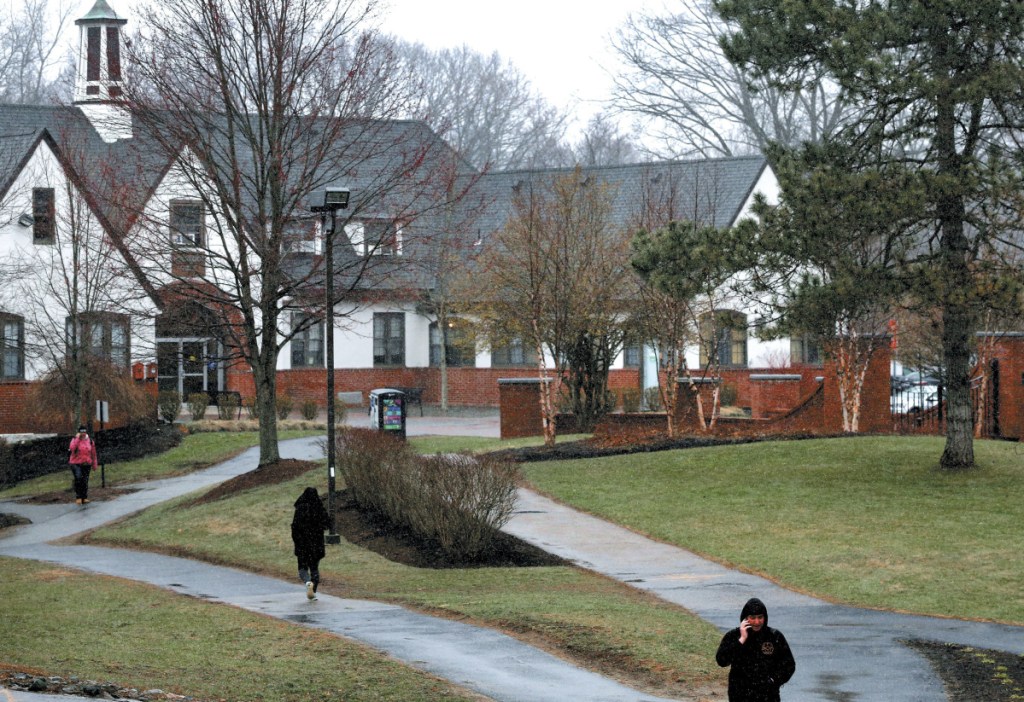 Students walk on the campus of Mount Ida College in Newton, Mass. "Did we go out and announce, 'Hello ... we're teetering on the brink of insolvency'? ... No," a school official says.