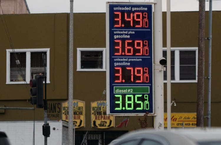 Gasoline prices are displayed at a gas station near downtown Los Angeles on Friday. Their recent rise stems from Trump's handling of the Iran nuclear deal, a reader writes.