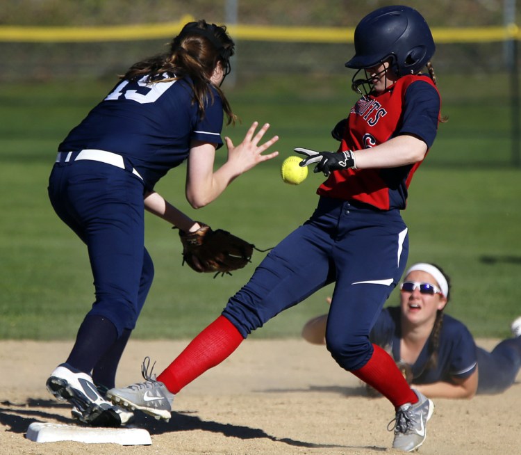 Alexa Thayer of Gray-New Gloucester beats a throw from Lydia Guay to Margaret McNeil of Yarmouth at second base Friday during Gray-New Gloucester's 5-1 victory.
