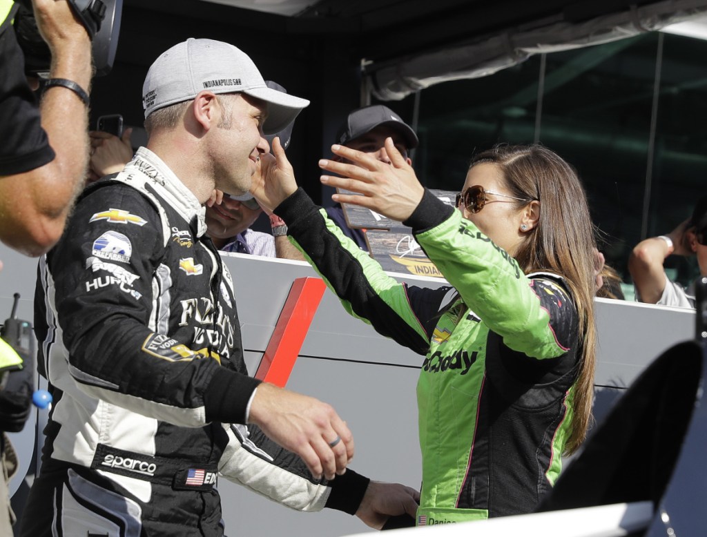 Ed Carpenter gets a hug from teammate Danica Patrick on Sunday after Carpenter won the pole for next weekend's Indianapolis 500. It was Carpenter's third Indy 500 pole. Patrick, meanwhile, qualified seventh.