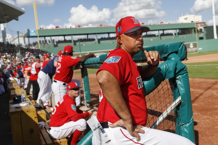 Boston Red Sox manager Alex Cora has proven deft so far in his handling of the team on and off the field. The Red Sox enter Tuesday's game at Tampa Bay with the most wins in baseball. (AP Photo/John Minchillo)