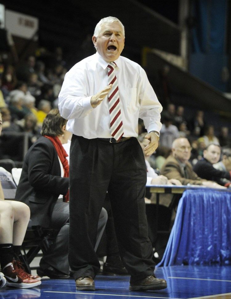 Tom Maines shouts out instructions while coaching the Scarborough girls' team during the 2012 state basketball tournament. (Staff Photo by John Ewing)