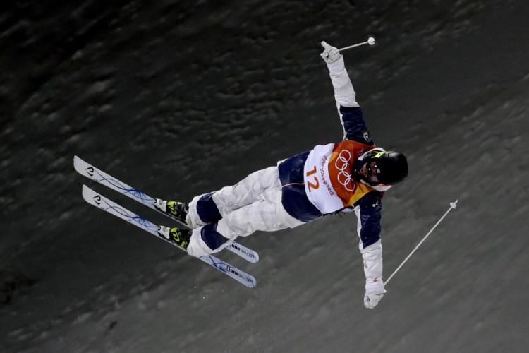 Troy Murphy jumps during the men's moguls qualifying at Phoenix Snow Park at the 2018 Winter Olympics in Pyeongchang, South Korea, on Feb. 12. (AP Photo/Lee Jin-man)