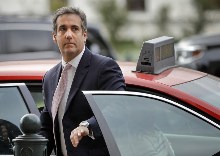 Michael Cohen, President Trump's personal attorney, steps out of a cab on Capitol Hill in September. When he went to work for the Trump Organization as a lawyer and executive vice president in 2006, he handed off the management of his taxi medallions first to Simon Garber and later to Evgeny Freidman.