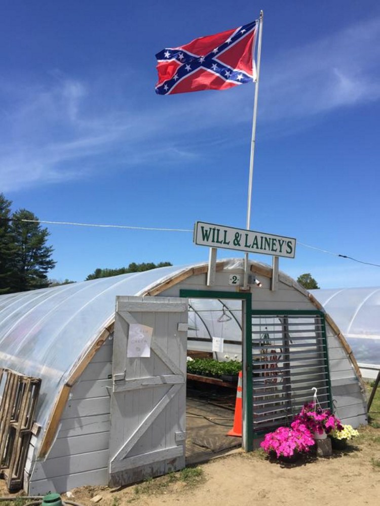 A Confederate battle flag flies over Will-N-Laineys farm stand in New Gloucester. A letter writer says he doesn't understand why any citizen would display it.