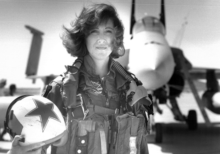 Lt. Tammie Jo Shults, one of the first women to fly Navy tactical aircraft, poses in front of an F/A-18A with Tactical Electronics Warfare Squadron (VAQ) 34 in 1992. 
