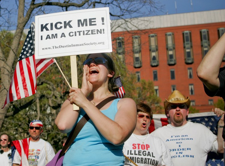Anti-immigrant demonstrators chant across from the White House in 2007 in Washington. "While ignoring American workers, our senators have no qualms about protecting illegal immigrants and their jobs," writes Jonette Christian, of Holden. 
