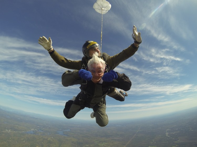 Dorothea Labrie, 86, of Lewiston goes sky diving with instructor Brian Boyle on Sunday.