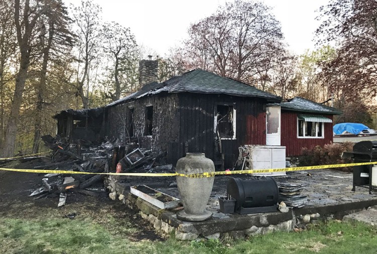 On Monday, the State Fire Marshals Office is expected to investigate the scene of the fire that destroyed this home at 1834 Riverside Drive in Vassalboro. 