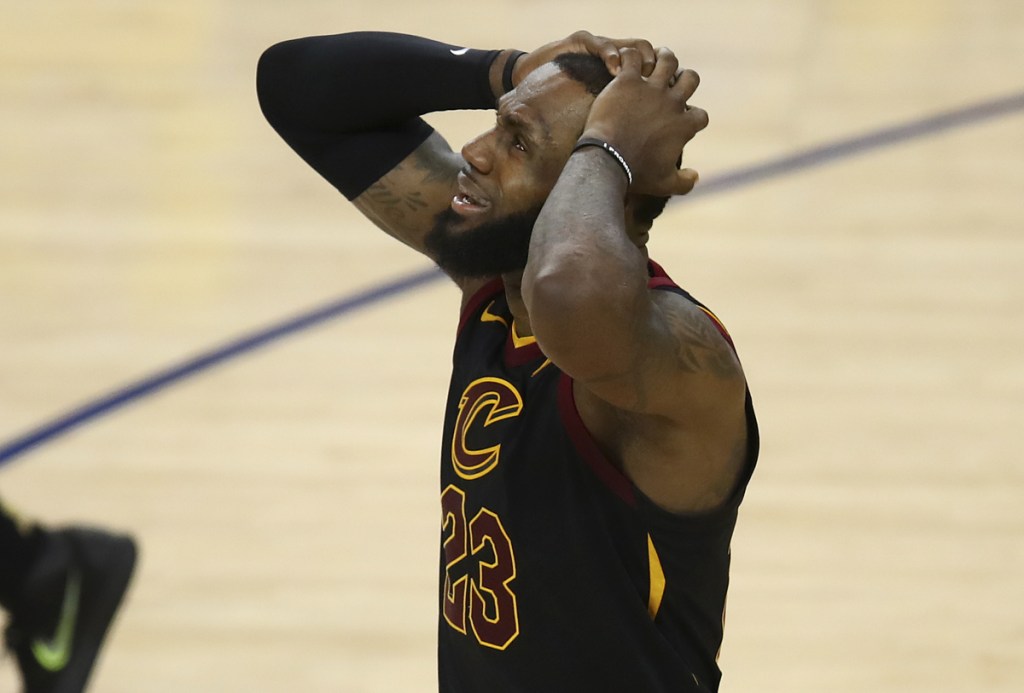 LeBron James reacts to a call in the second half of Cleveland's overtime loss. He finished with 51 points.