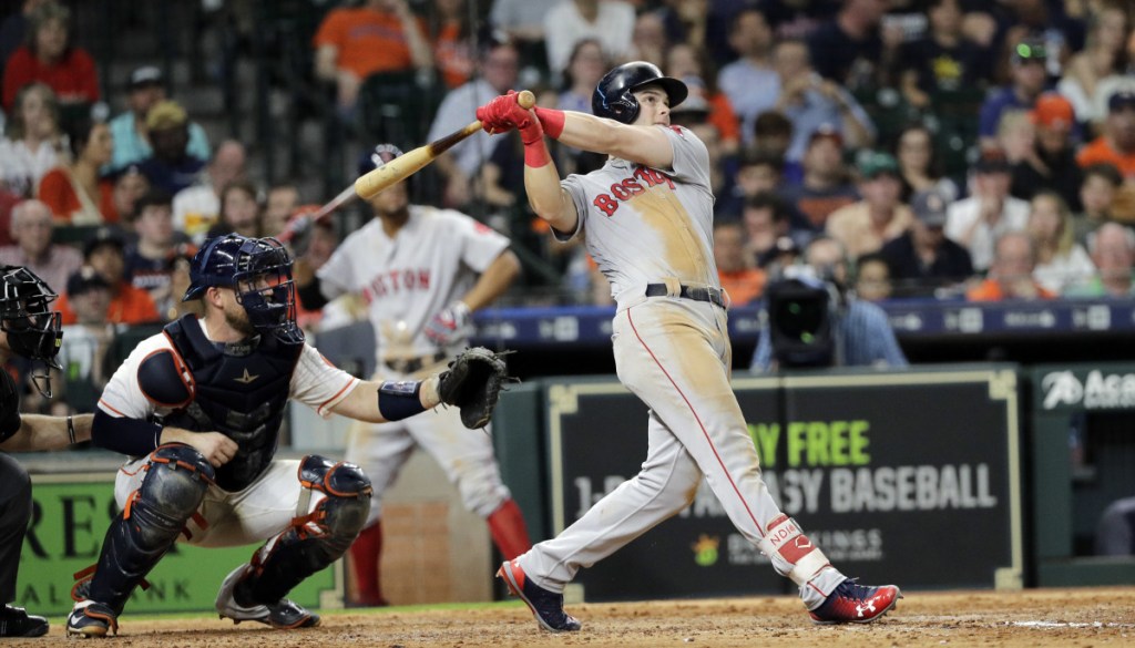Andrew Benintendi connects for a tiebreaking two-run homer in the seventh inning Saturday night, lifting the Red Sox to a 5-3 win over the Houston Astros.