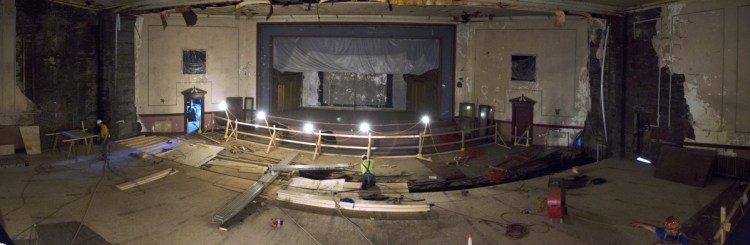 Floor repairs are underway Tuesday at the Colonial Theatre in Augusta. The floor work covers a big hole in the main floor of the theater that went all the way through to the basement.
