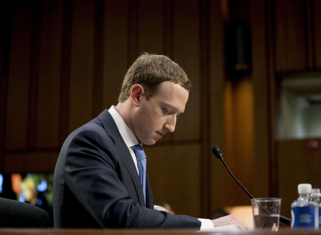 Facebook CEO Mark Zuckerberg testifies before a joint hearing of the Commerce and Judiciary committees in April. Lawmakers asked Zuckerberg in a letter Tuesday if he now wanted to amend his April testimony.