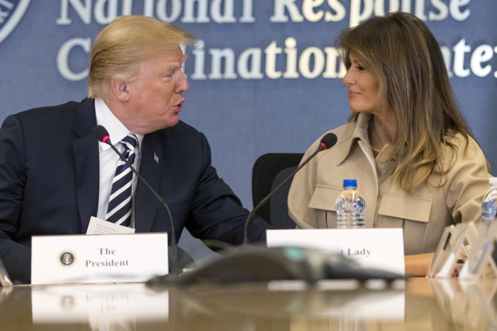 President Trump looks toward first lady Melania Trump at a briefing on this year's hurricane season at the Federal Emergency Management Agency Headquarters, Wednesday,