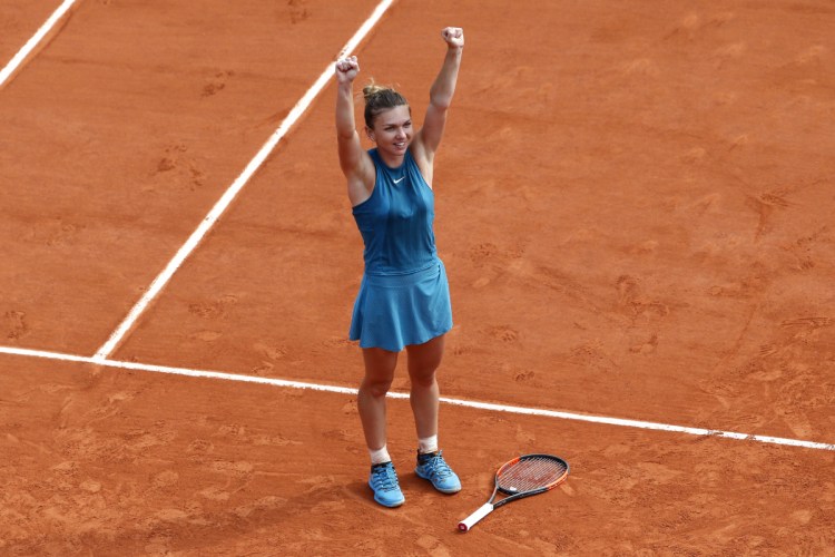Romania's Simona Halep celebrates after she defeated Sloane Stephens of the U.S. during their final match of the French Open at Roland Garros on Saturday in Paris. Halep won 3-6, 6-4, 6-1.