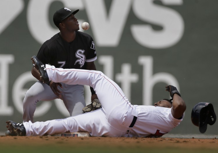 Boston's Jackie Bradley Jr., bottom, steals second base as Chicago's Tim Anderson, top, is unable to get his glove on the ball in the second inning of Chicago's 5-2 win Sunday in Boston.