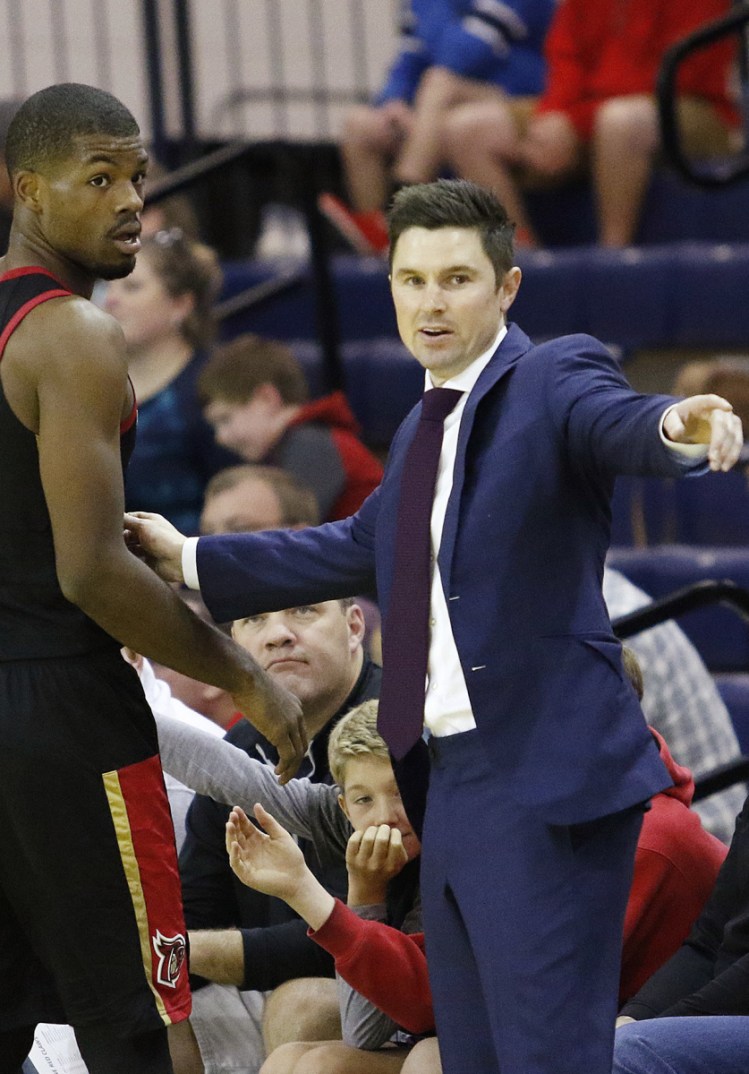 Josh Longstaff, right, the head coach for the Erie BayHawks will be an assistant coach with USA Basketball for the World Cup.