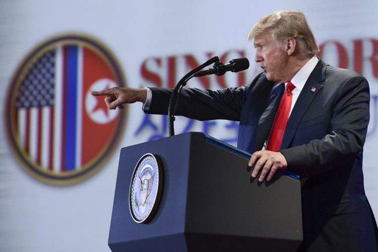 President Trump answers, during a news conference on Sentosa Island in Singapore on Tuesday, said he will suspend U.S. military drills in South Korea, where 28,500 U.S. troops are stationed.