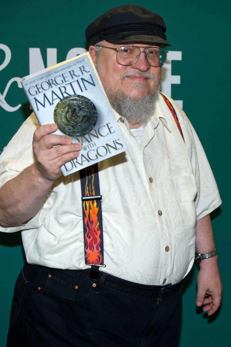 Author George R.R. Martin appears at a book signing for "A Dance with Dragons" in 2011. Martin hinted that none of the characters from 'Game of Thrones' will appear in the new show.