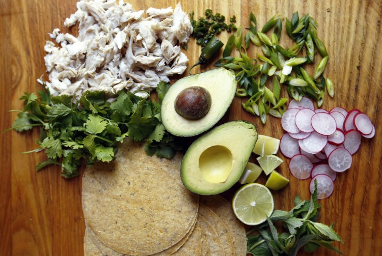 Ingredients for this salpicon – Spanish for "hodgepodge" – include leftover fish and avocado, radishes, herbs and scallions.
