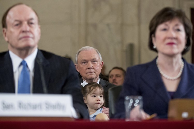 Attorney General-designate Jeff Sessions and Sen. Susan Collins await Sessions' testimony at his 2017 confirmation hearing. A reader calls on Collins to decry separating asylum-seeking families.